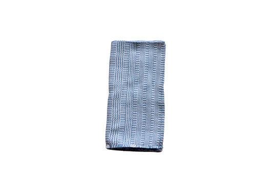 Folded chambray and white patterned napkin