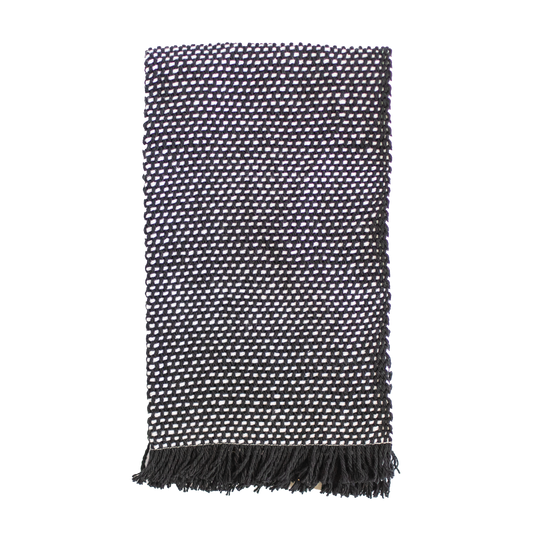 Folded black and white hand towel
