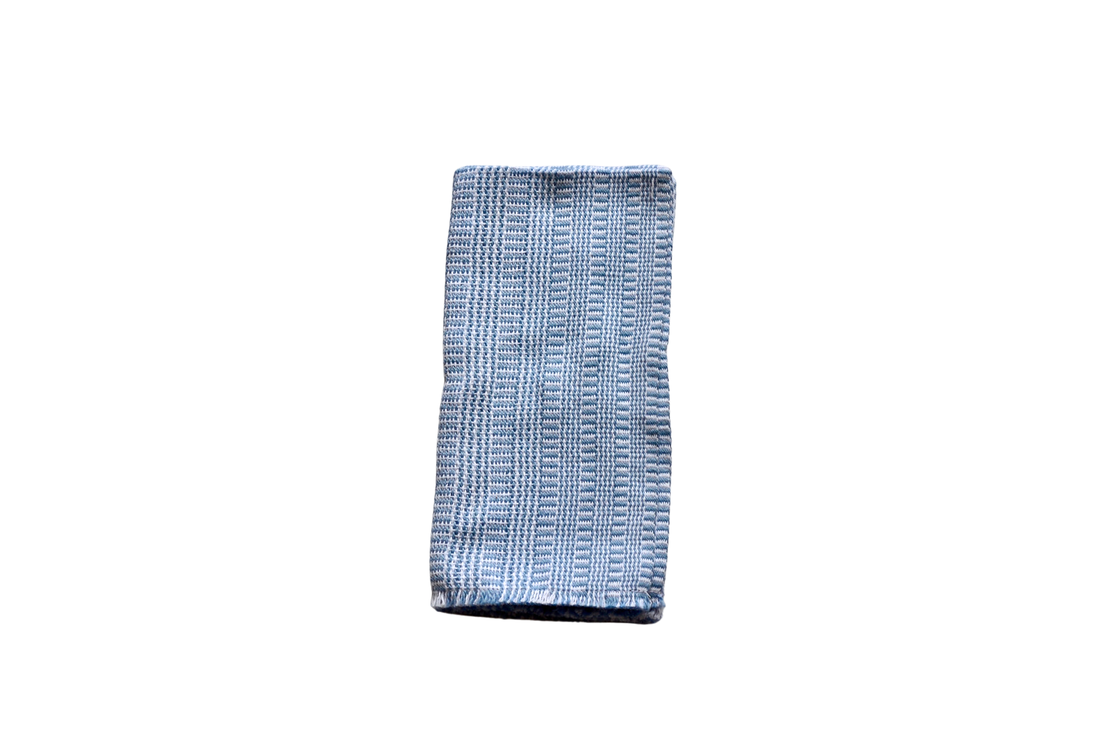 Folded chambray and white patterned napkin