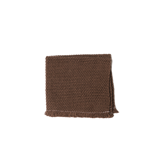 Folded chocolate brown wash cloth