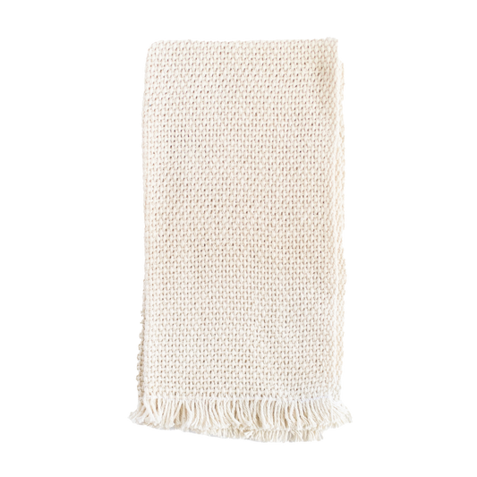 Folded cream hand towel