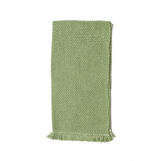 Folded green hand towel