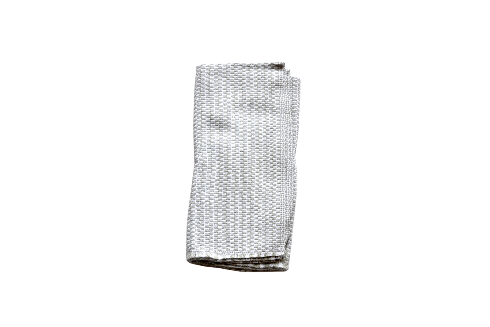 Folded greige and white patterned napkin