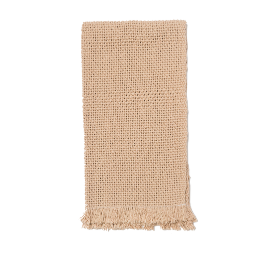 Folded tan hand towel