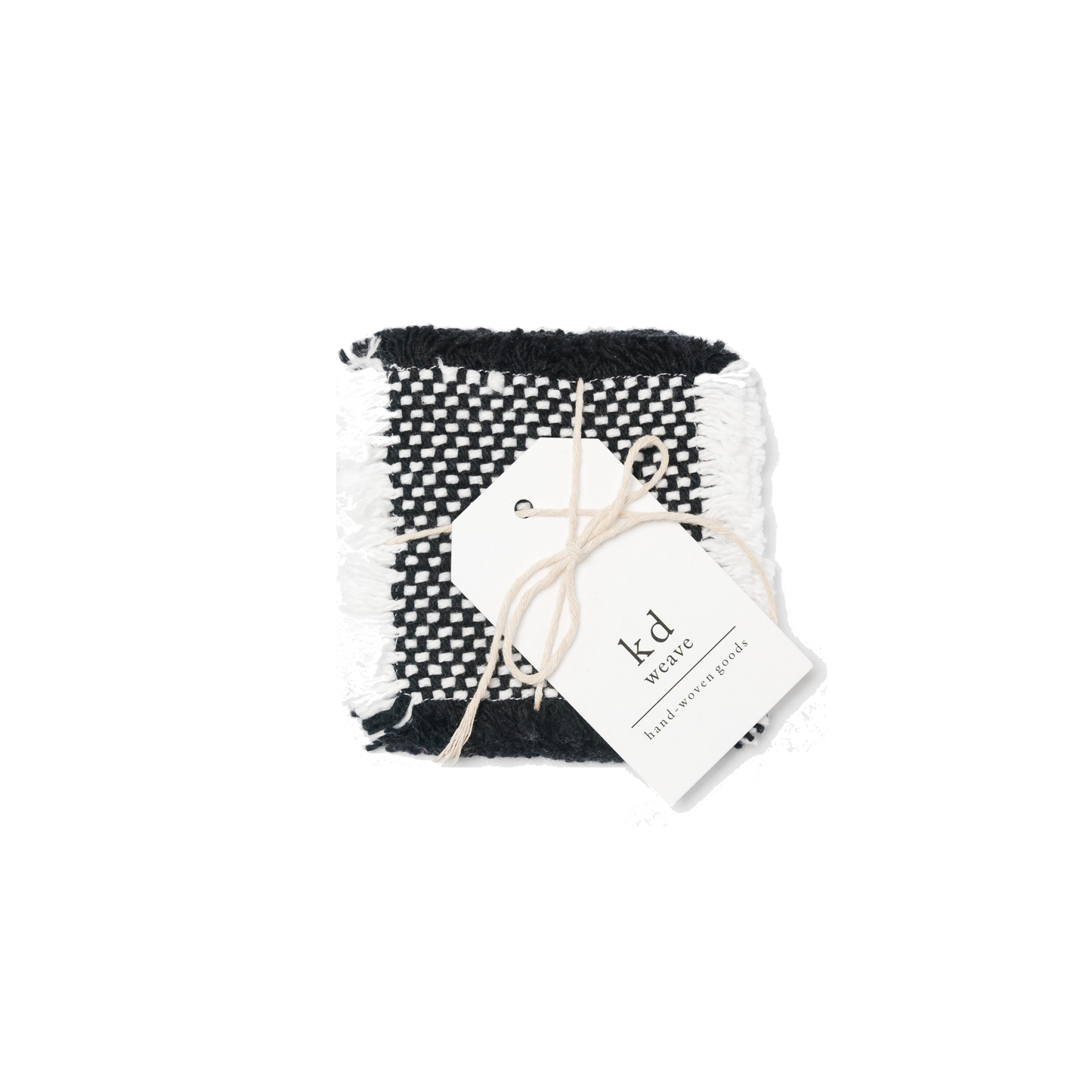 White and black coasters wrapped in twine