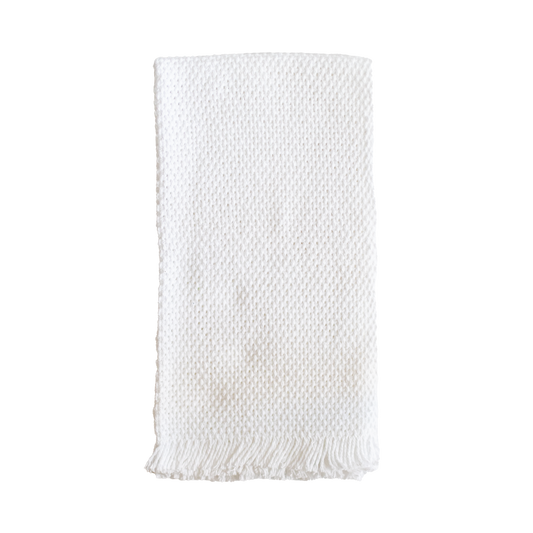 Folded white hand towel